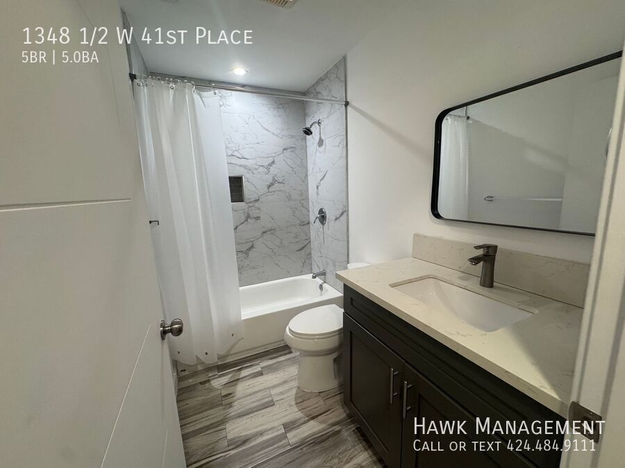 Spacious 5-Bedroom, 5-Bathroom at 1348 1/2 W 41st Place property image