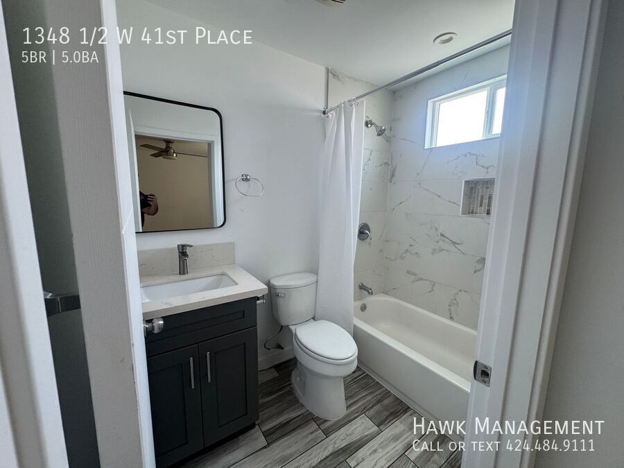 Spacious 5-Bedroom, 5-Bathroom at 1348 1/2 W 41st Place property image