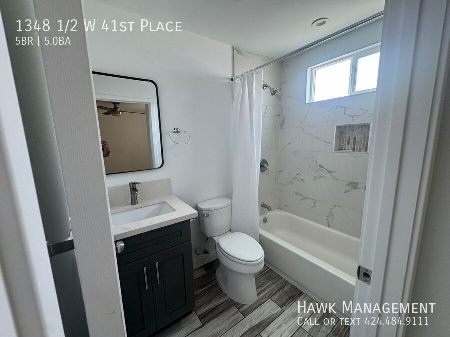 Spacious 5-Bedroom, 5-Bathroom at 1348 1/2 W 41st Place property image