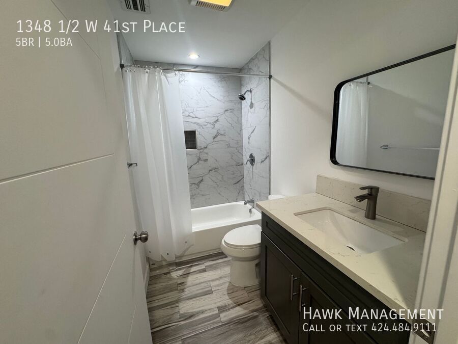 Spacious 5-Bedroom, 5-Bathroom at 1348 1/2 W 41st Place property image
