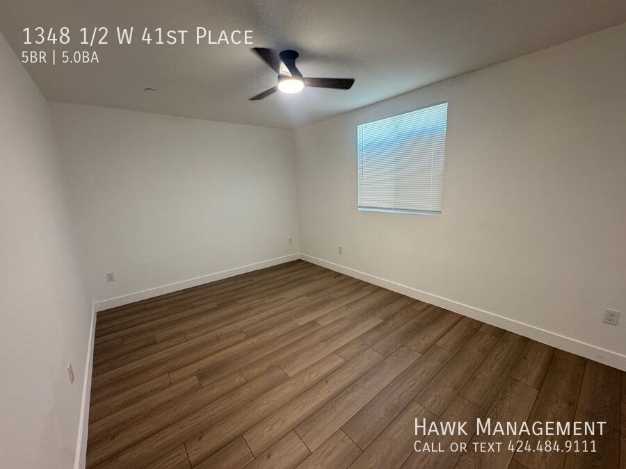 Spacious 5-Bedroom, 5-Bathroom at 1348 1/2 W 41st Place property image
