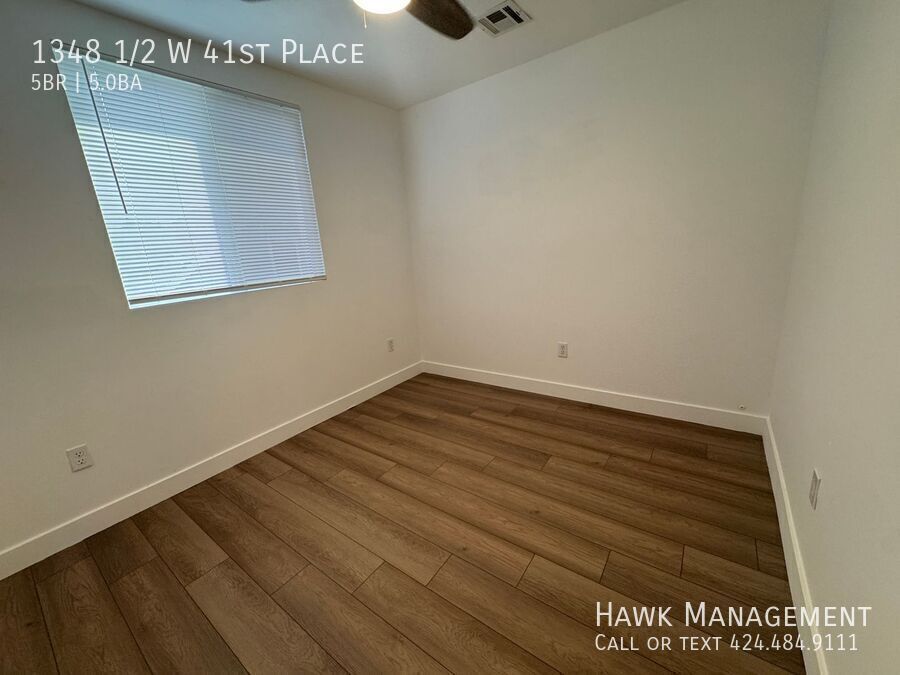 Spacious 5-Bedroom, 5-Bathroom at 1348 1/2 W 41st Place property image