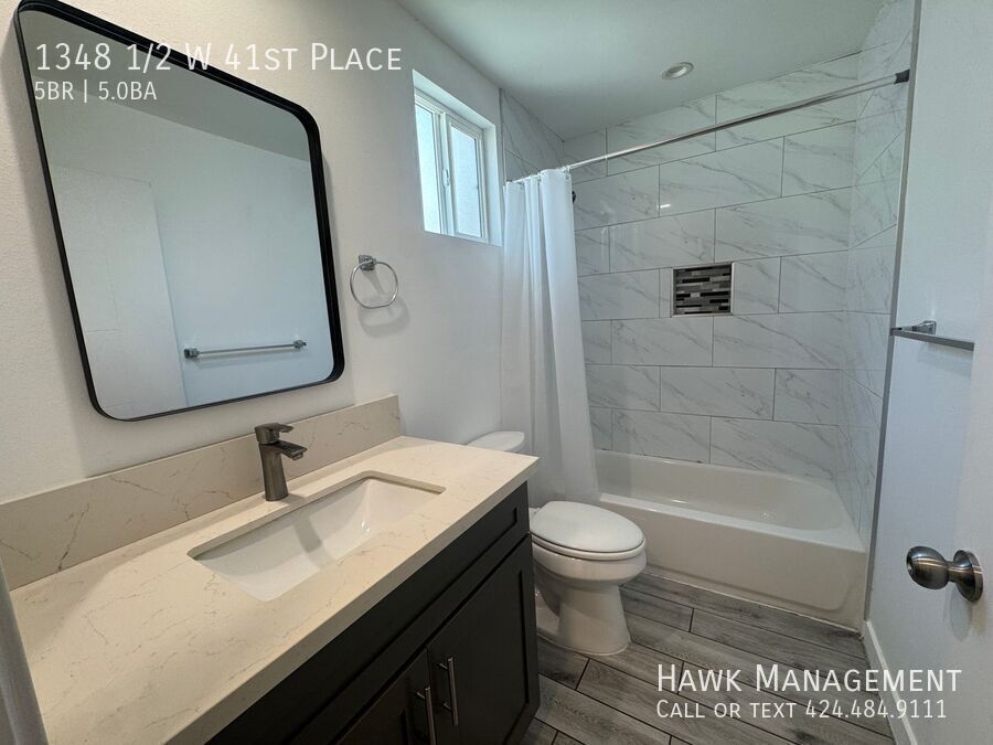 Spacious 5-Bedroom, 5-Bathroom at 1348 1/2 W 41st Place property image